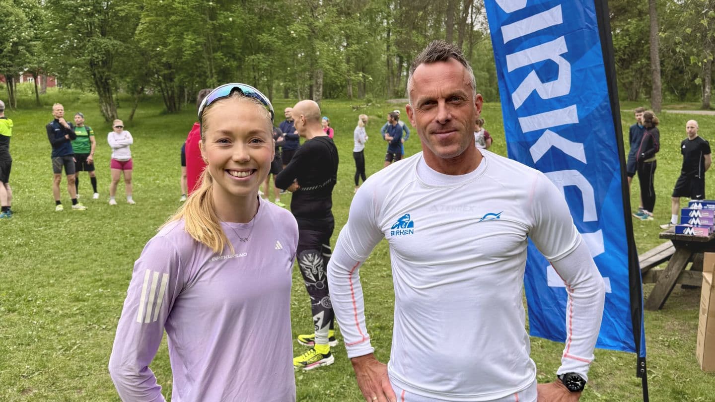 Veronica Undseth og Anders Aukland på Sognsvann under Birken-trening med Birken-flagg i bakgrunnen